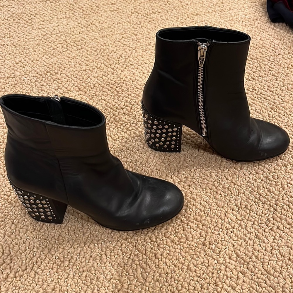 Black Dolce Vita booties with silver grommets